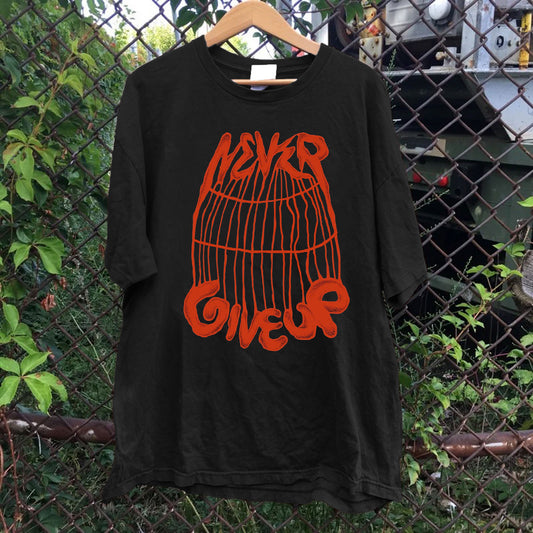 Never Give Up Cage Tee